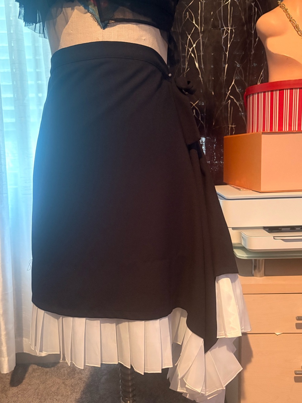 Black Asymmetrical Wrap Skirt with White Pleated UnderlayerCalvin Tran